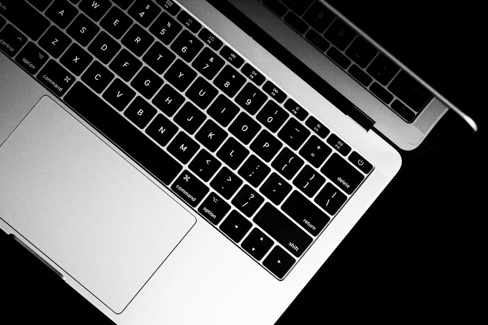 Clean black and silver laptop computer on a desk