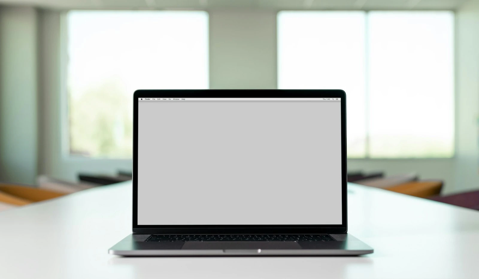 MacBook Pro on a white table