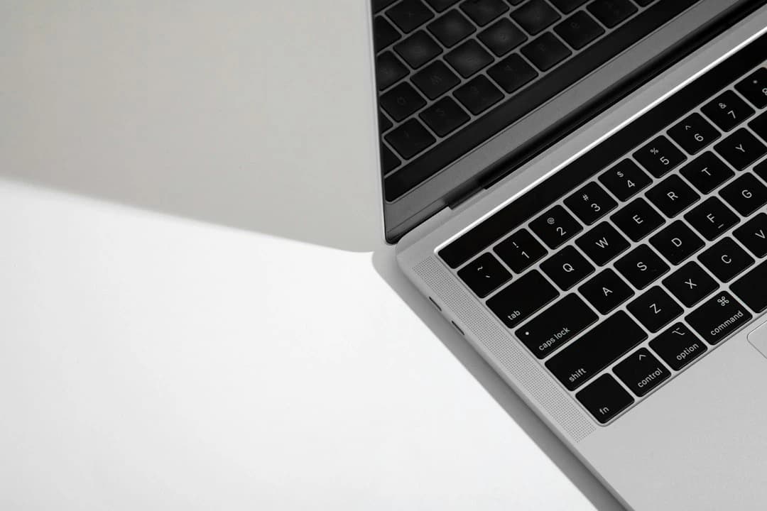 Laptop keyboard with the top function-key row visible